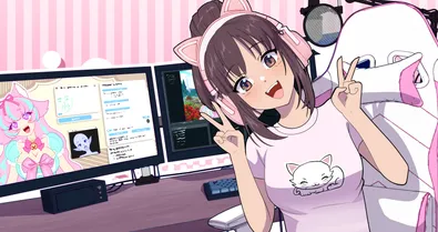 Anime-style VTuber wearing pink cat-ear headphones and a T-shirt with a sleeping cat design, smiling and making peace signs in front of a dual-monitor streaming setup. One monitor shows digital art and a chat window, while the other displays editing software. A microphone, white-and-pink gaming chair, and pink striped background complete the cozy streaming workspace