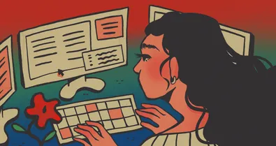 A woman typing on a keyboard and glancing at one of three screens.