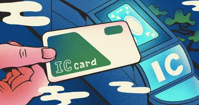 Illustration of a hand holding an IC transit card over a Japanese ticket gate, with stylized clouds and trees in the background.