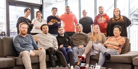 The team posing for a photo