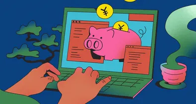 A person using a laptop with displaying a piggy bank and Japanese yen
