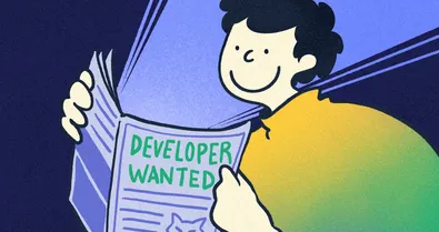 A person smiling while viewing a pamphlet with "Developer Wanted" on the cover.